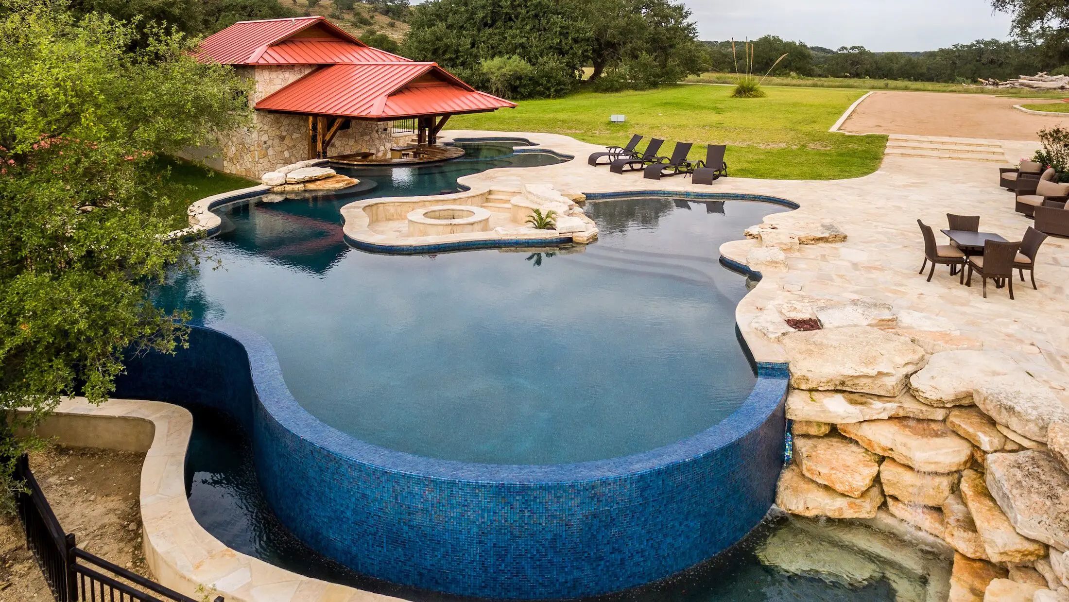 Texas Hill Country pool with waterfall features